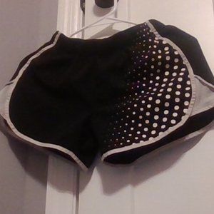 Girls black athletic Justice shorts with polka dot